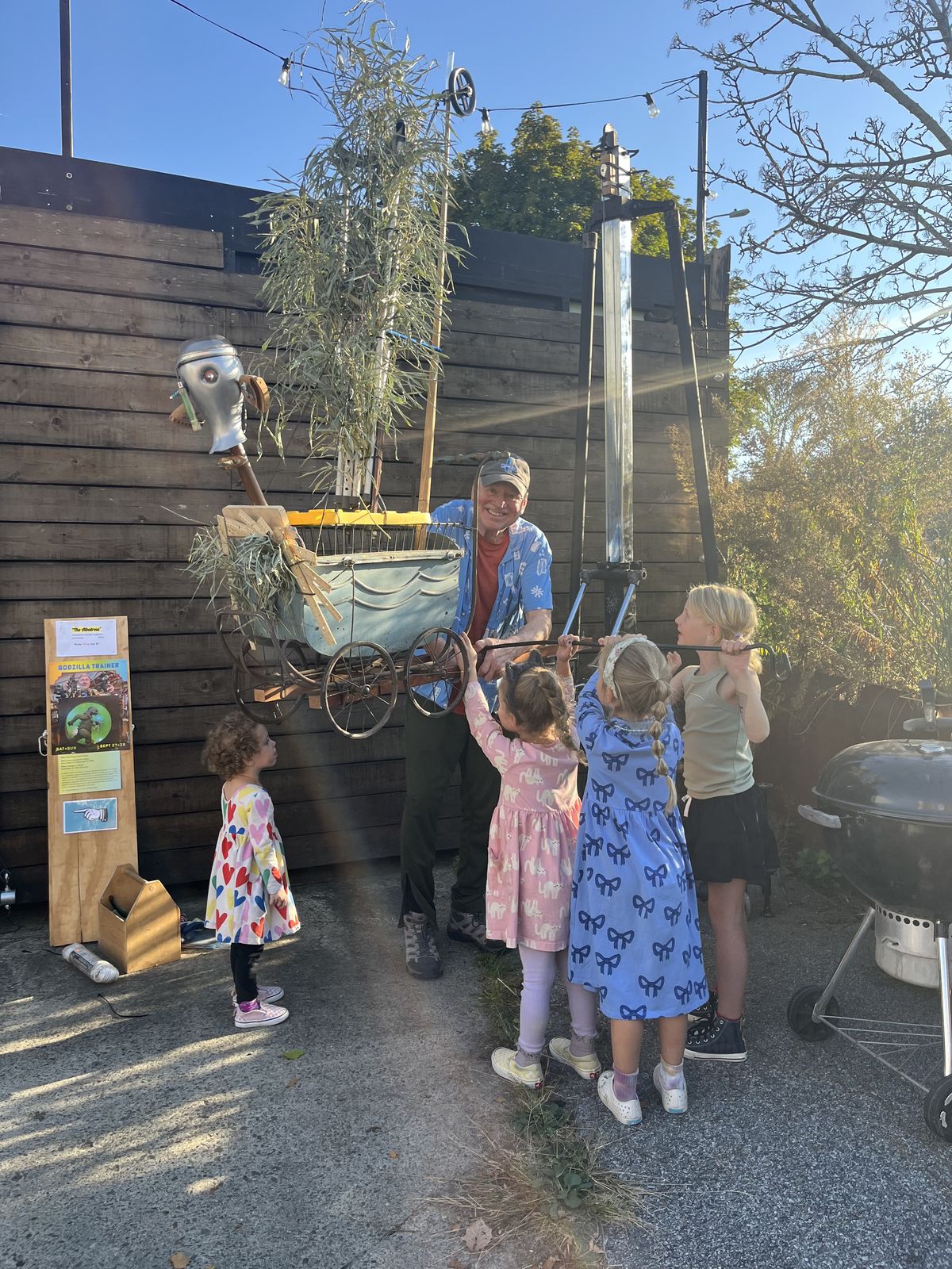 Festival volunteers and young visitors
